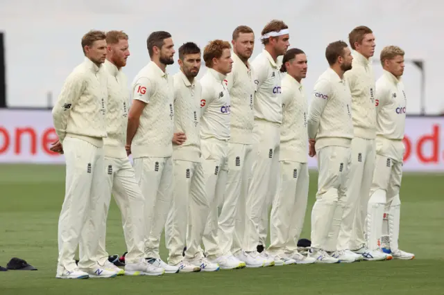 England players stand for national anthem