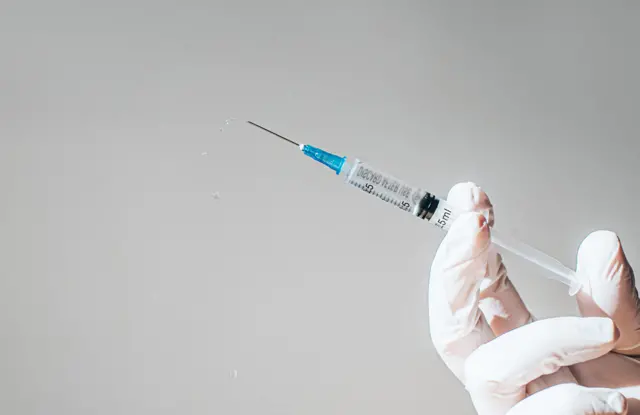 Stock image of a vaccine needle