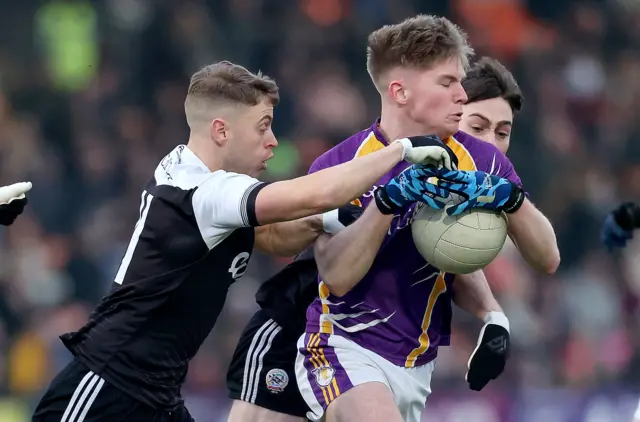 Kilcoo's Jerome Johnston and Derrygonnelly's Aaron Jones