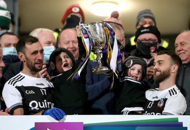 Aidan Branagan and Conor Laverty lift the cup