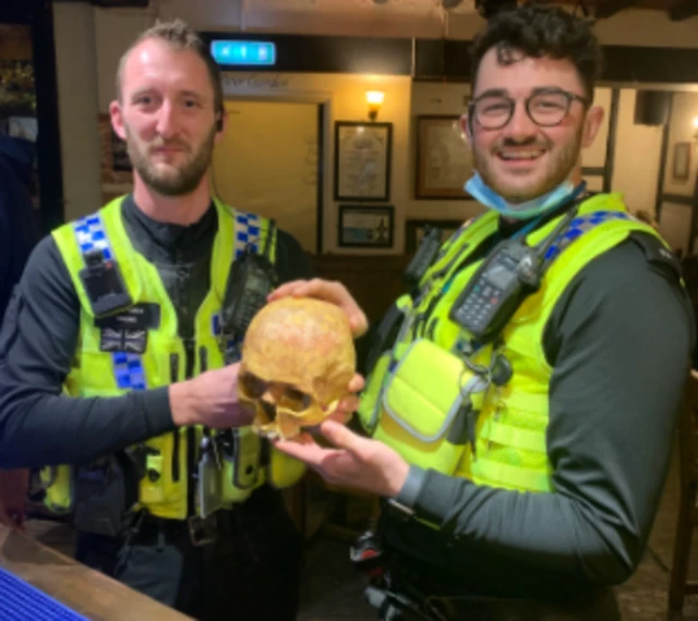 PC David Young and PC Bill Davies with the skull