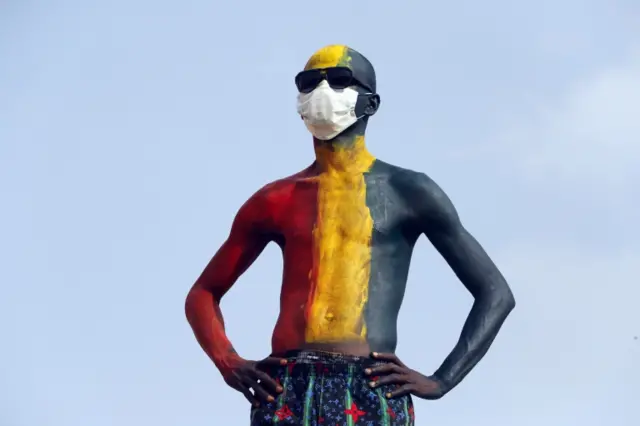 Football fan at Guinea-Zimbabwe match