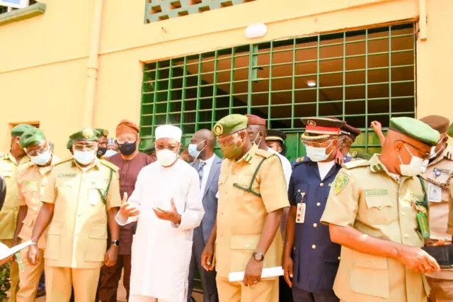 Rauf Aregbesola with prison staff