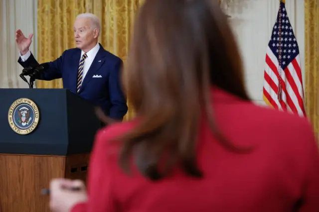 US President Joe Biden answers questions during a news conference