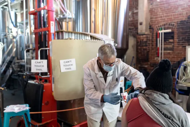 Vaccinations take place at a brewery in Maine