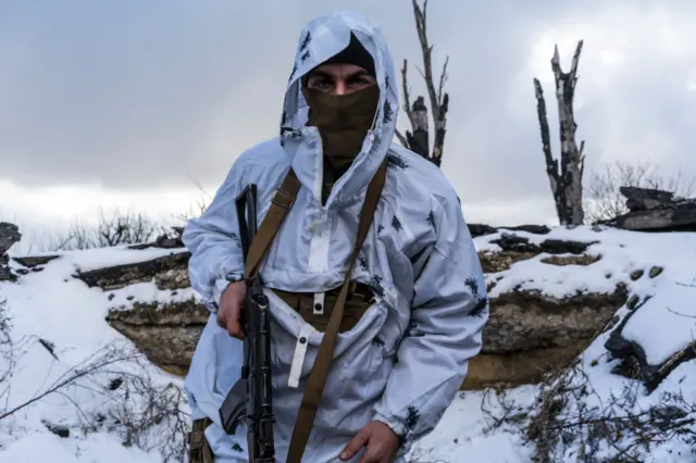 A Ukrainian soldier seen in a frontline trench earlier this month