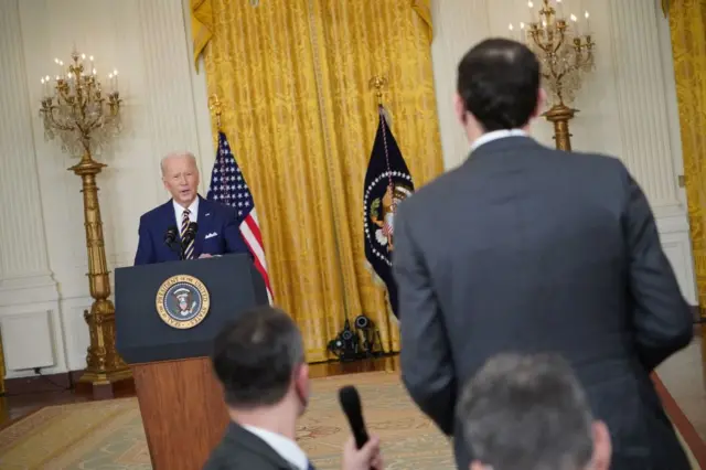 US President Joe Biden answers questions during a news conference in the East Room of the White House