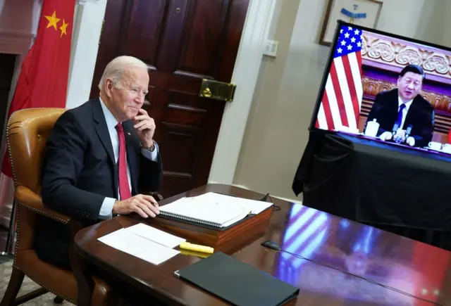 US President Joe Biden meets with China's President Xi Jinping during a virtual summit from the Roosevelt Room of the White House in Washington, DC, November 15, 2021