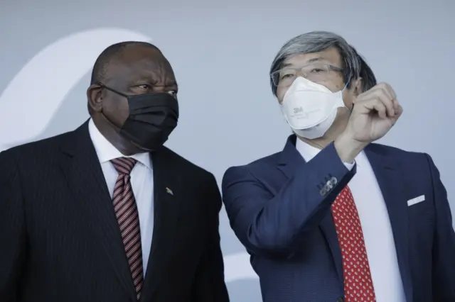 South African President Cyril Ramaphosa (L) and founder of NantWorks Dr Patrick Soon-Shiong (R) chat during the inauguration of the NantSA Vaccine Production Facility in Cape Town, South Africa, 19 January 2022