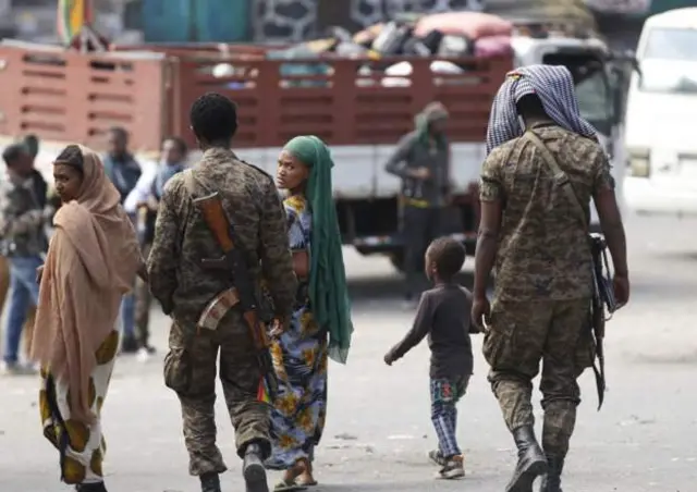 Soldiers walk on the streets in northern Ethiopia