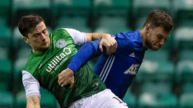 Hibs' Lewis Stevenson and Cove Rangers' Mitch Megginson