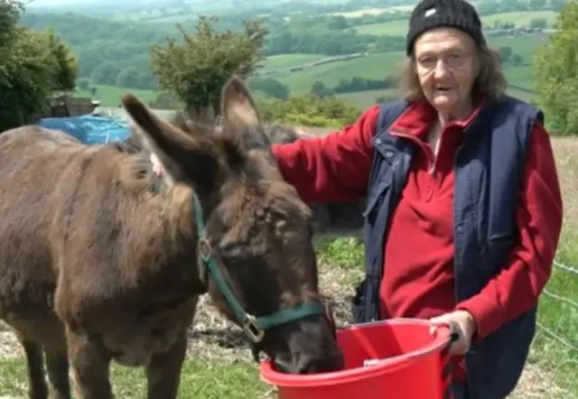 Margarite Geraldine Gibson with donkey