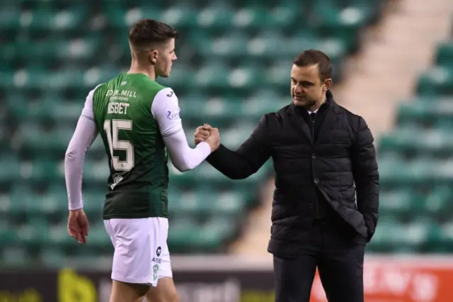 Shaun Maloney and Kevin Nisbet at full-time