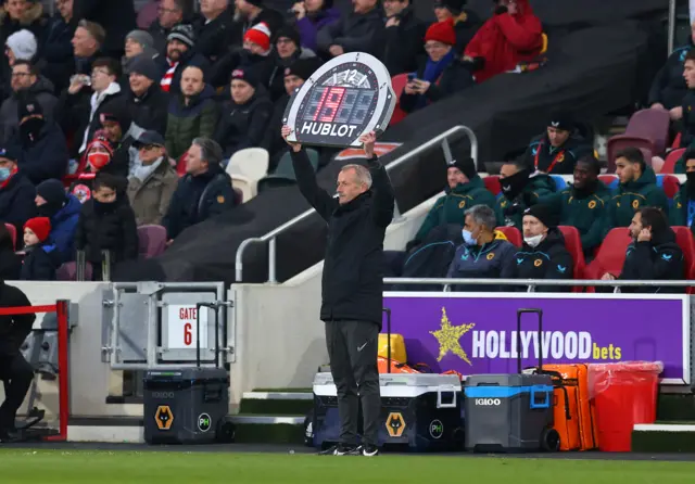 Martin Atkinson holds up a board for 19 extra minutes