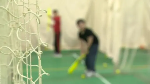 Afghan refugee children playing cricket