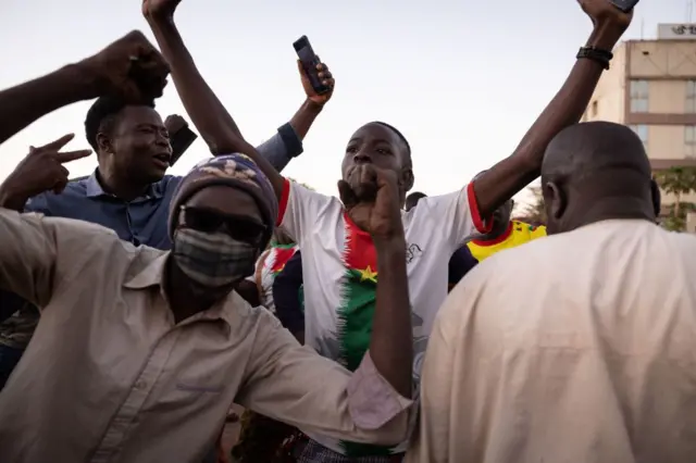 People gather at Nation square to celebrate and support the Burkina Faso military in Ouagadougou on January 24, 2022