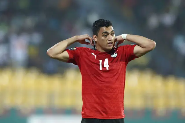 Egypt's forward Mostafa Mohamed reacts during the Group D Africa Cup of Nations (AFCON) 2021 football match between Egypt and Sudan at Stade Ahmadou Ahidjo in Yaounde on January 19, 2022