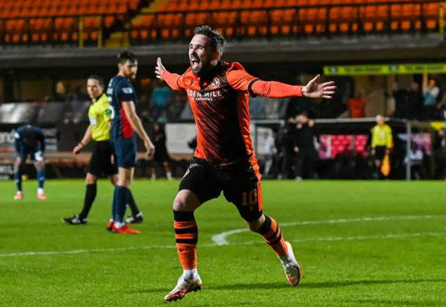 Nicky Clark found a late winner to halt a run of six straight league losses for Dundee United