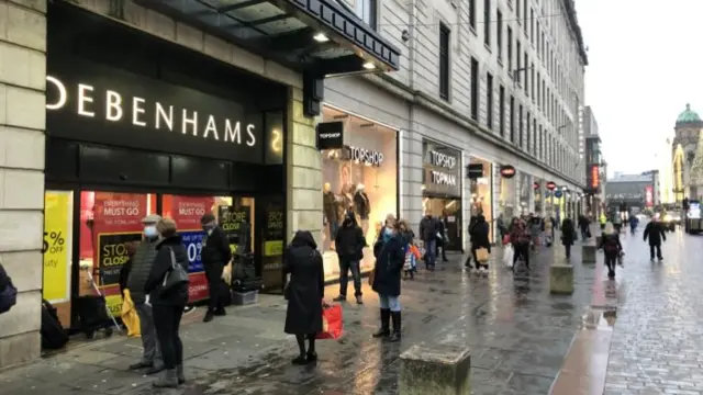 shoppers in high street