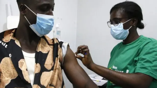 Man in Ivory Coast receives Covid vaccine