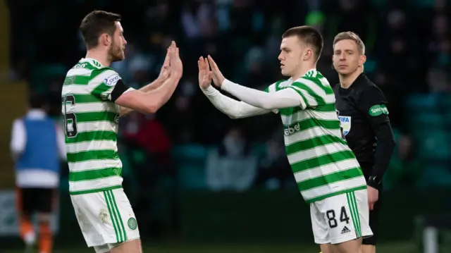 Young winger Doak (right) is on for Anthony Ralston (left)