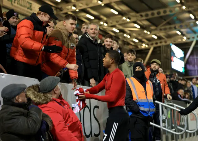 Rhian Brewster gives a fan his shirt