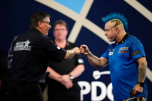 Gary Anderson and Peter Wright.