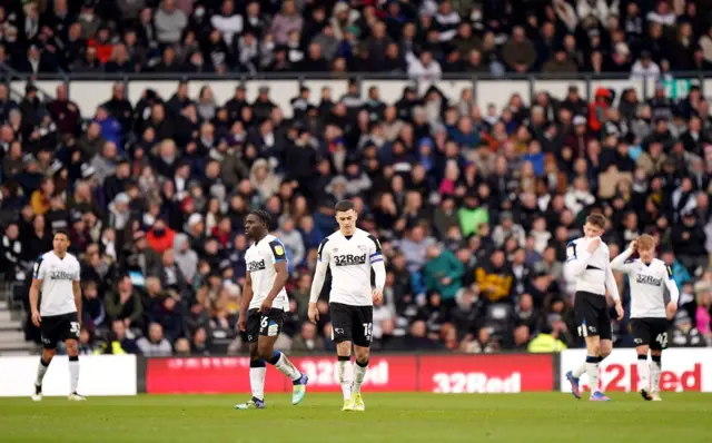 Dejected Derby players