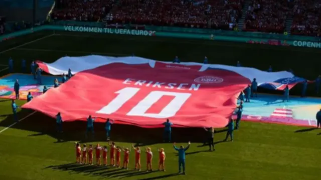 An Eriksen short is held aloft ahead of Denmark's Euro 2020 game with Finland