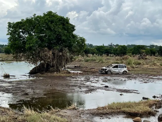 A battered car.