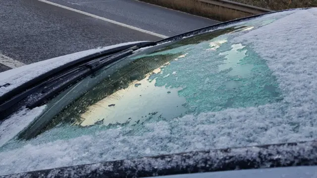 The half-defrosted windscreen