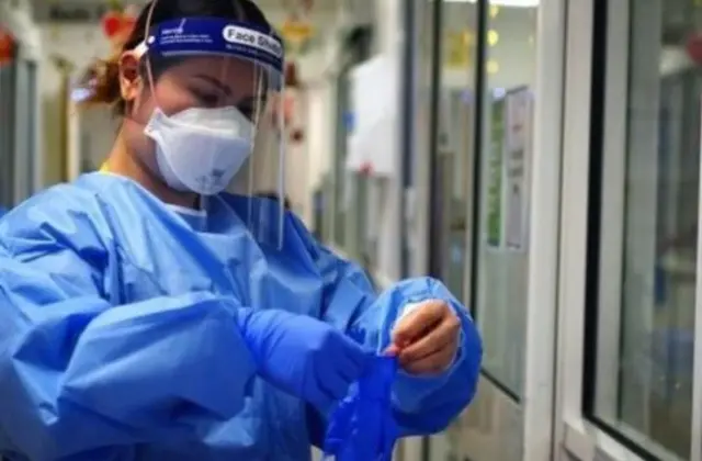 NHS worker in PPE