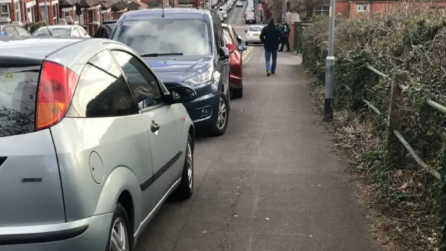 Cars parked on pavement