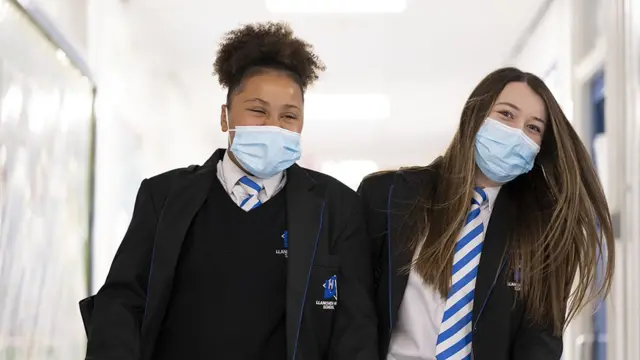 School pupils wear masks