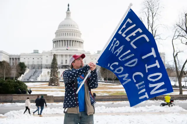 Keith Scott attended the pro-Trump protest outside Congress last year and has returned today