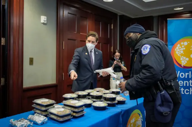 The congressman hands out free lunches