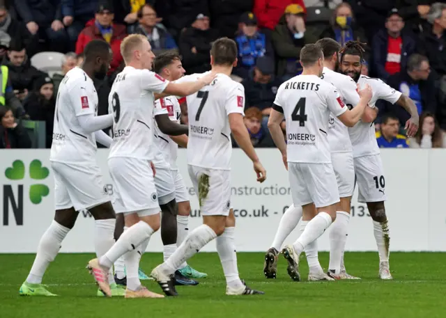 Boreham Wood's Tyrone Marsh (right) celebrates scoring