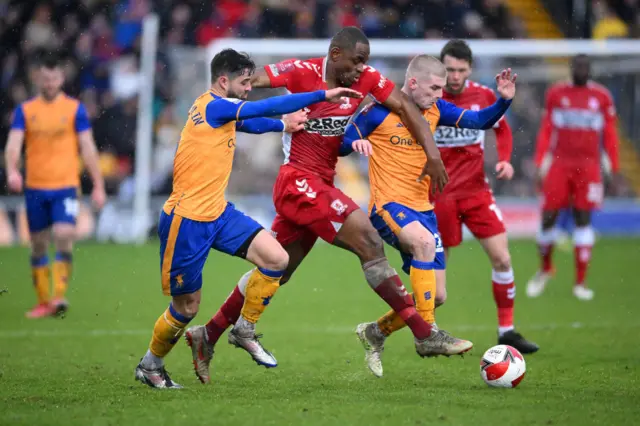 Action shot of Mansfield v Middlesbrough