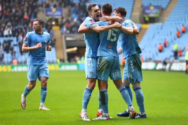 ominic Hyam of Coventry City celebrates with teammates after scoring