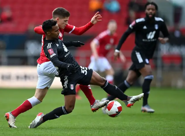 Ayman Benarous of Bristol City battles for possession with Tyrese Francois of Fulham