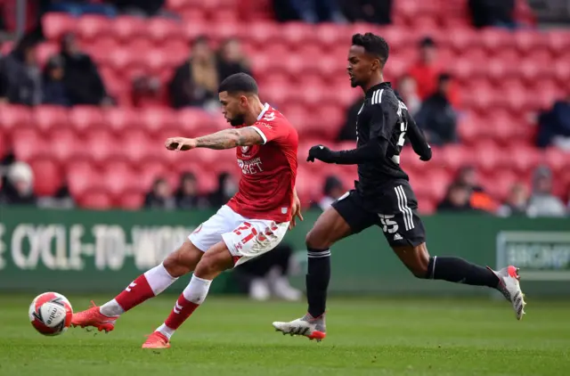 Bristol City"s Nahki Wells shoots under pressure from Fulham"s Tyrese Francois