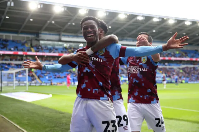 Nathan Tella celebrates his goal for Burnley at Cardiff