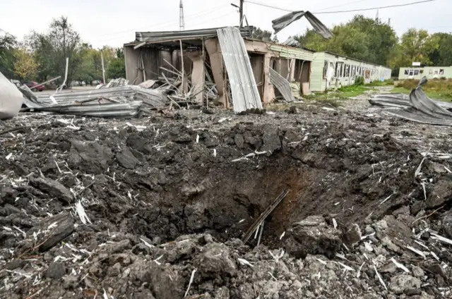 A huge crater from deadly missile attack on civilians near Zaporizhzhia, 30 Sep 22