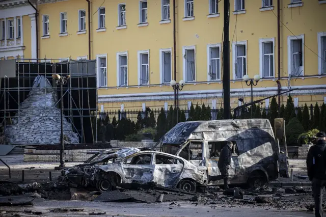 Emergency service personnel attend to the site of a blast on October 10, 2022 in Kyiv, Ukraine