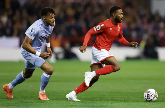 Aston Villa's Tyrone Mings and Forest's Emmanuel Dennis