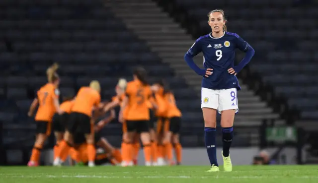 Caroline Weir dejected as Ireland celebrate