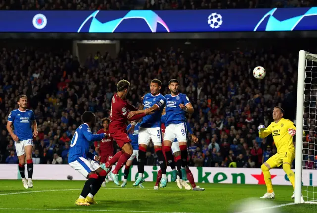 Liverpool's Roberto Firmino scores their side's first goal of the game during the UEFA Champions League Group A match at Ibrox Stadium