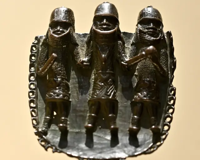 A copper alloy piece by an Edo artist from Benin City, Edo State, Nigeria stands in the gallery the Benin Bronzes repatriation ceremony and reception at the National Museum of African Art on October 11, 2022 in Washington, DC