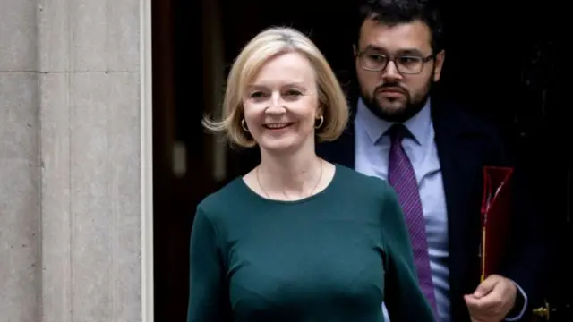 Britain's Prime Minister Liz Truss departs her official residence at 10 Downing Street to appear at Prime Minister's Questions at Parliament in London, Britain, 12 October 2022.