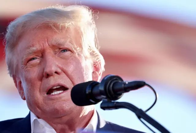 Former US President Donald Trump speaks at a campaign rally at Legacy Sports USA on October 09, 2022 in Mesa, Arizona.